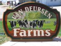 Dairy farm advertising cedar sign