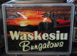sandblasted development sign for Waskesiu Bungalows Prince Albert National Park in northern Sask.