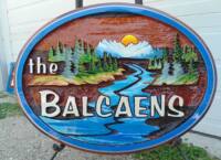 sand carved for the Balcaens in Armstong BC, cedar sign, artist painted, hand crafted by Condor Signs Vernon BC.