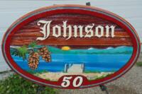 Sand carved cedar Sign for new beach property near Hundred Mile House BC.Hand crafted artist painted custom designed by Condor systems Verno BC