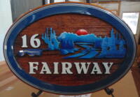 Cedar wood sign sandblasted and artist painted for house on golf course St. Albert Alberta Canada.Custom made by Condor signs/systems Vernon BC Canada