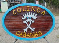 Sandblasted sign for Colinda Cabanas Caye Caulker Belize Condor signs has shipped signs around the world.