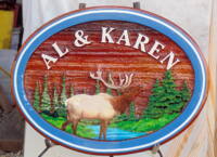 Recreational sign for a fine couple who own an elk farm in Sask.Custom made designed and constructed of sand blasted cedar by Condor Signs Vernon BC