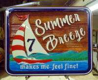 cedar sandblasted sign cottage on Okanagan Lake BC custom made and artist painted bt Condor Signs Vernon BC Canada