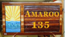 Australian aboriginal art sandblasted cedar sign for Silver Star Resort Vernon BC rental property by Condor Signs.