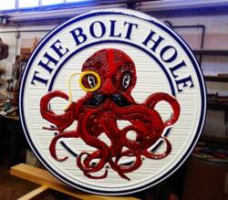 The Bolt Hole resort.Bed and Breakfast on the westcoast of Canada.Three D carved by Condorsigns vernon BC