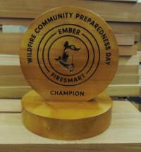 hand made custom memorial Wood trophy for Firesmart. Brought to life by Condor signs Vernon BC