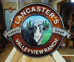 Cedar wood sign.Valley view Ranch Smithers BC